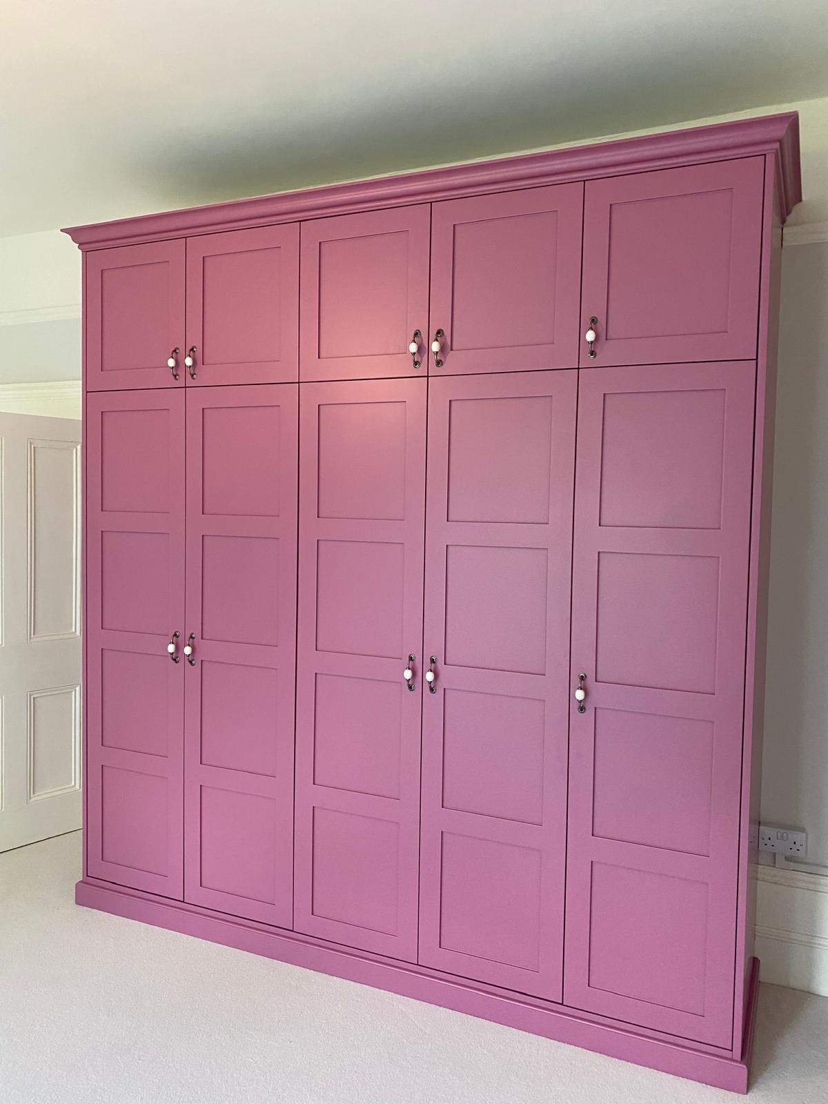 Essex bespoke furniture with customised shelving units. Built in storage. Custom wardrobes. Quality high end carpentry in Chelmsford Essex.